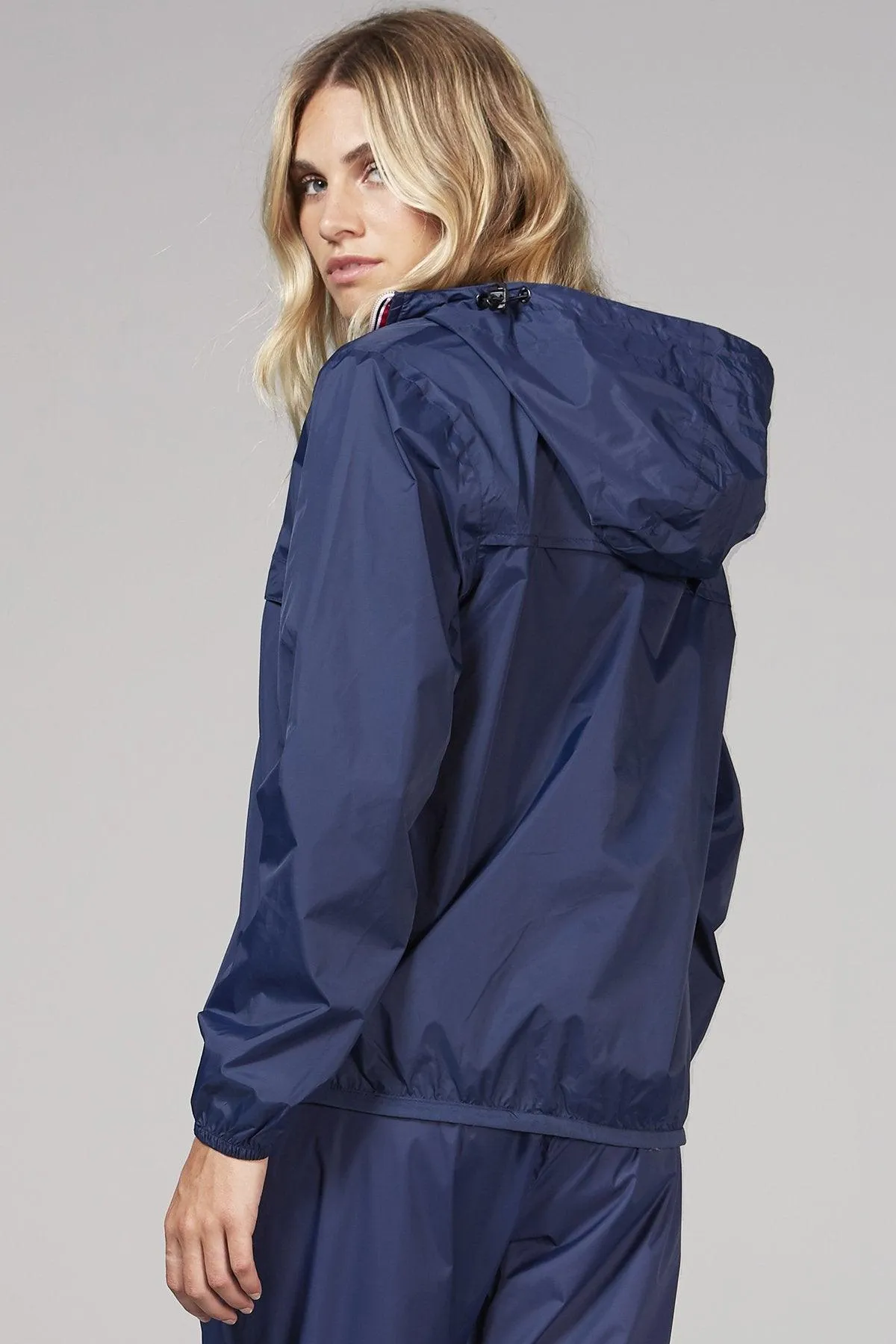 Navy quarter zip packable rain jacket and windbreaker